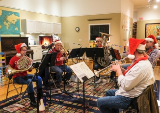 Downtown Brass plays seasonal music at the Washington Street Pre-School