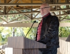 John Thompson delivers remarks at the Tower of the Four Winds rededication Saturday at Back Elk- Neihardt Park.