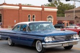 Mike Jones and grandkids cruise by in a ’60’s Pontiac Star Cheif.